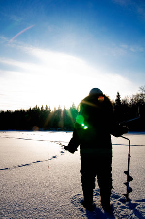 The fisherman admires the natureの写真素材