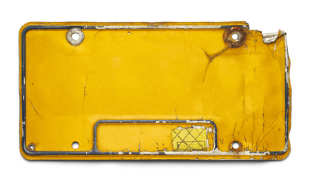Old Yellow License Plate with Copy Space Isolated on a White Background.の写真素材