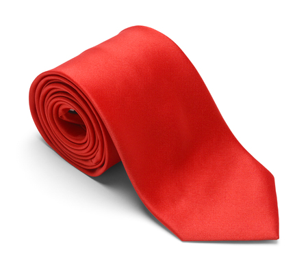 New Mens Red Necktie Rolled Up Isolated on a White Background.の写真素材