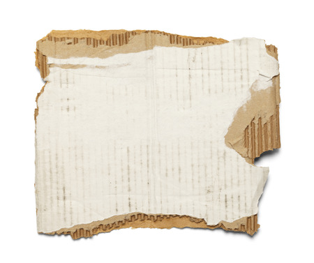 Old Worn Piece of Cardboard with Copy Space Isolated on a White Background.の写真素材