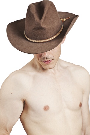 handsome man in brown cowboy hatの写真素材