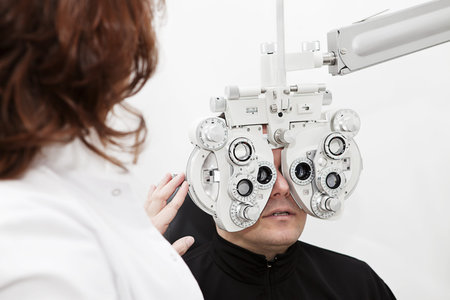 man being sight tested by the optometrist