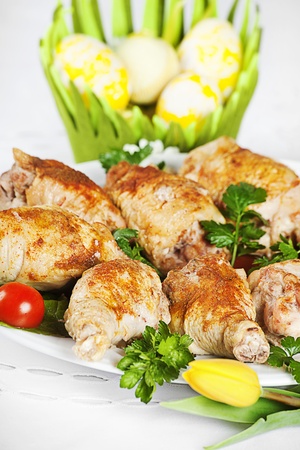 Plate Of Roasted Turkey With Easter Egg And Flower Decoration