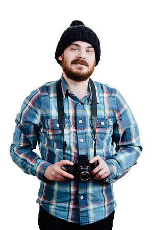 Portrait of a red-bearded, balding male brutal. White isolated background. A man in a blue plaid...