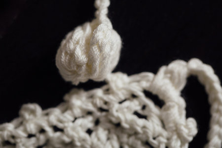 white wool handmade knitted part of blouse , super macro closeup, concept Softness is tenderness.の写真素材