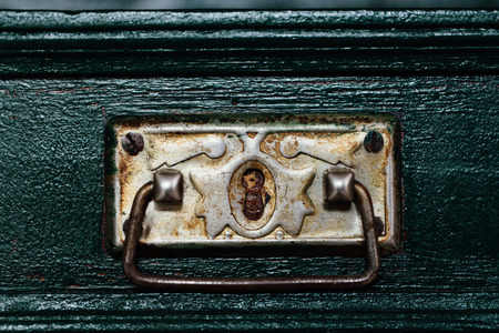 The close up image of old and rusty metallic handle.の写真素材