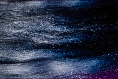 Set of locks different purple hair color samples. Braiding with synthetic purple color kanekalon.の写真素材