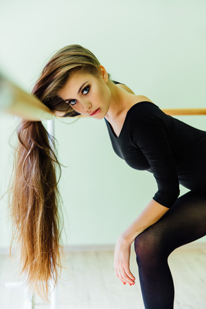 Modern ballet dancer in a ballet classの写真素材