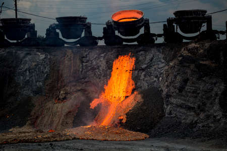 Domestic slag discharge at the iron foundry, industrial landscapeの写真素材