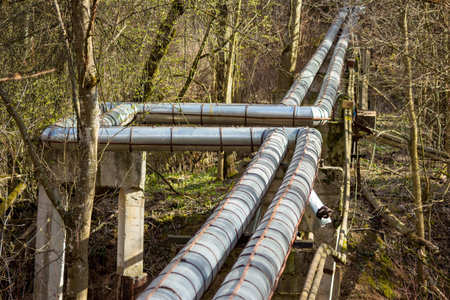 Pipes with hot and cold water laid through a ravine