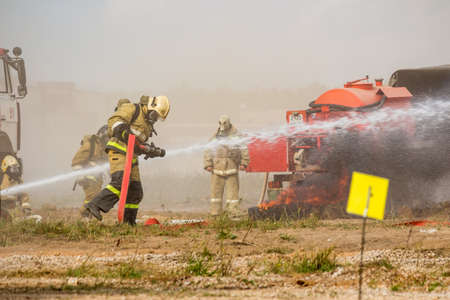 Obninsk, Russia - September 13, 2019: Civil Defense exercises. Fire fighting training on fire extinguishingのeditorial素材