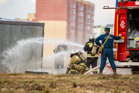 Obninsk, Russia - September 13, 2019: Civil Defense exercises. Fire fighting training on fire...