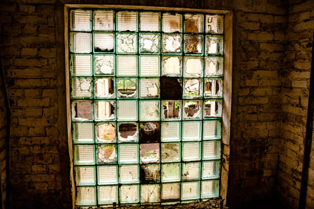 The window of an abandoned industrial factory