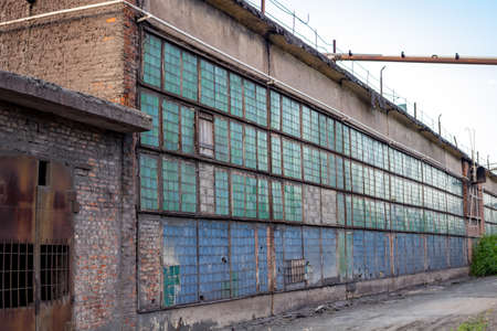 The abandoned old factory building outsideの写真素材