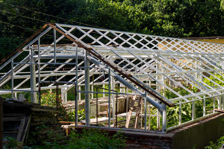 The structure of a flower greenhouse with removed glazingの写真素材