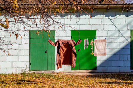 Linen hanging on a clothesline outside, drying clothesの写真素材