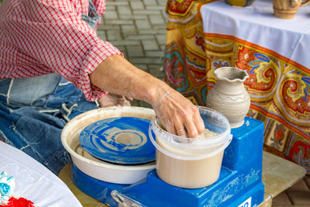 Sculpting on a potter's wheel. Festival of Folk Art and Crafts. Fair of Crafts