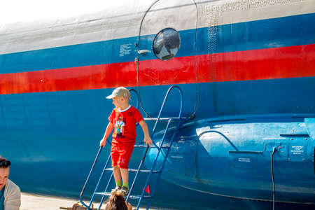 Ermolino, Russia - August 15, 2015: Open Day at the airbase in Ermolino. Russian turboprop airplane Antonov An-12 RF-12042 of Russian Air Force, The door to the cabinのeditorial素材