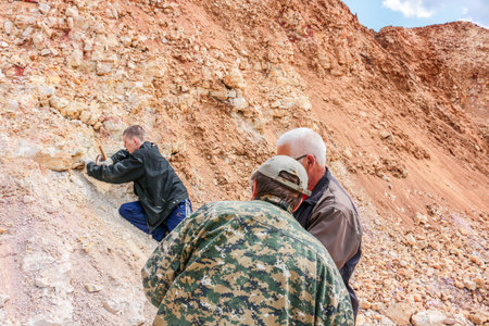 Novomikhailovskoe, Russia - May 2016: Collection of geological samples on a limestone quarry
