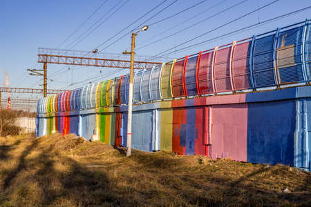 Painted in the colors of the rainbow railway station platform, colors of rainbowの写真素材