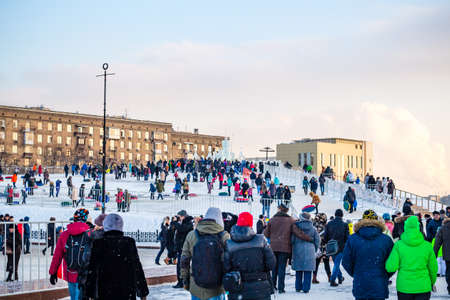 Moscow, Russia - January 7, 2016: Christmas Festival on Poklonnaya Hill in Moscow "Ice Moscow". View of the hill on Poklonnaya Hill where people go for a rideのeditorial素材