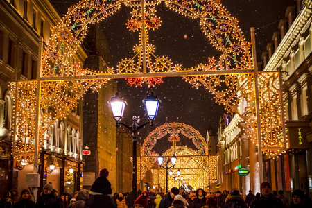 MOSCOW, RUSSIA - JANUARY 7, 2016: Light arches on Nikolskaya street at Christmas in Moscow. Pedestrian zone with luminous archesのeditorial素材