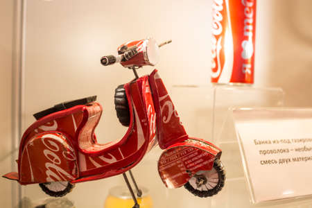 GARBAGE MUSEUM "MU-MU", RUSSIA - OCTOBER 2016: Exhibits of the museum of garbage. Moped from the cans of Coca-Colaのeditorial素材