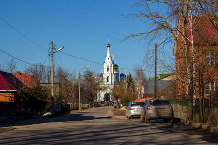Maloyaroslavets, Russia - April 2018: View of the Cathedral of the Assumption of the Blessed Virgin from Uspenskaya Street in Maloyaroslavets, in the springtimeのeditorial素材