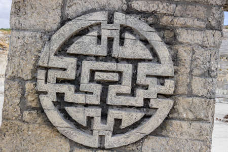 INKERMAN, CRIMEA - SEPTEMBER 2014: Imitation of the ancient sacrificial altar in the old career of Inkermanのeditorial素材