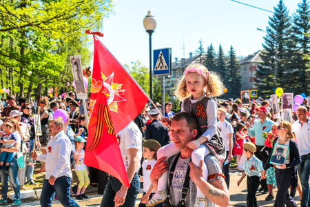 Obninsk, Russia - May 9, 2016: Celebration of the Victory Day, Great Patriotic War 1941-1945. A girl...