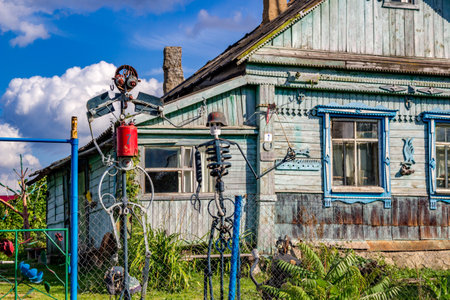 Tinkovo, Russia - August 2018: Homemade sculptures from garbage near a village house in the village of Tinkovo. Zhukovsky district, Kaluzhskiy regionのeditorial素材
