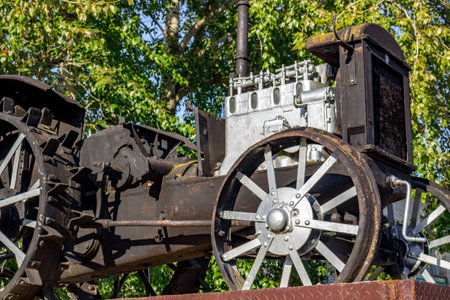 Vysokinichi, Russia - August 2018: Monument to the first tractor HTZ (Kharkov tractor plant) in the village of Vysokinichi, Russia. Kaluzhskiy region, Zhukovskiy districtのeditorial素材