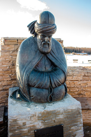 Kaluga region, Russia - March 2019: Monument to the Persian poet Jalal ad-Din Muhammad Rumi (also known as Mevlana, Mevlevi) in the ethnographic park Ethnomirのeditorial素材