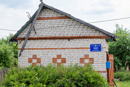 Tishnevo, Russia - June 2019: Russian Post in an old rural buildingのeditorial素材