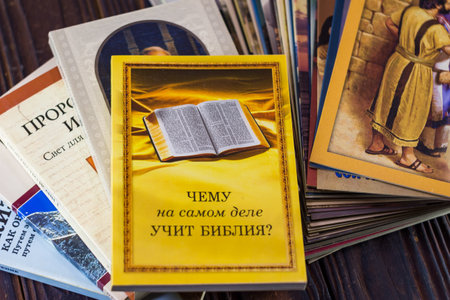 Russia - December 2020: Religious literature of Jehovah's Witnesses (organization banned in Russia). Books of the early 2000s in Russianのeditorial素材