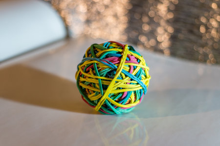 A rubber ball made of stationery elastic bands close