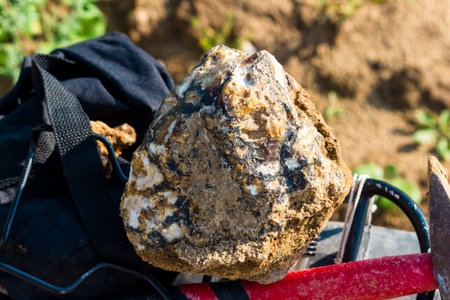 Large rough agate stone found in a sand quarryの写真素材