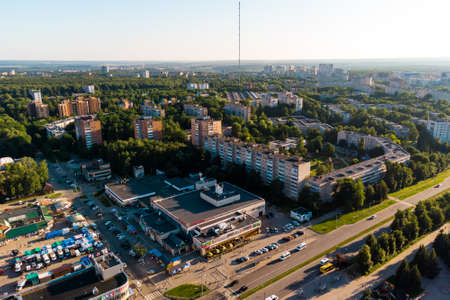 Panoramic aerial view of the urban development of a provincial town and a high-rise meteorological mast: Obninsk, Russia - July 2021のeditorial素材