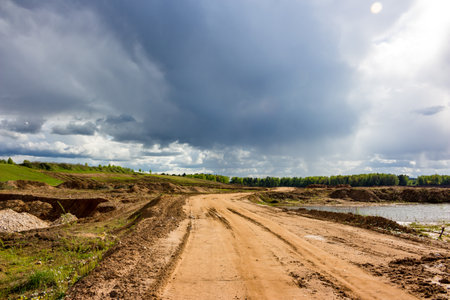 Winter landscape from the air with a view of the village on the border with the forestの写真素材