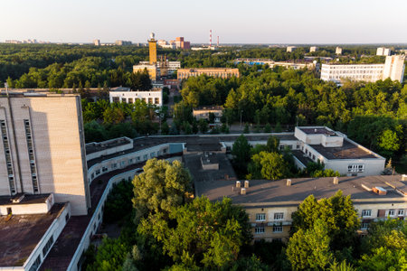 Soviet urban architecture surrounded by trees, aerial view. Obninsk, Russiaの写真素材