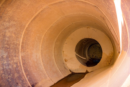 View of an old rusty water tower from the inside