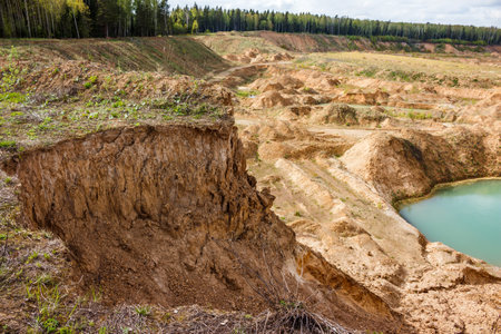 The crumbling side of a sand quarryの写真素材