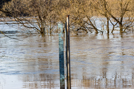 Large ruler measuring the river rise in metersの写真素材