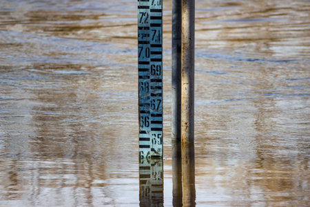 Large ruler measuring the river rise in metersの写真素材