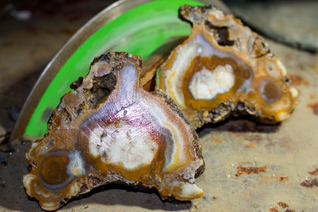 Quartz-chalcedony agate sawed with a diamond disk in a stone-cutting workshop