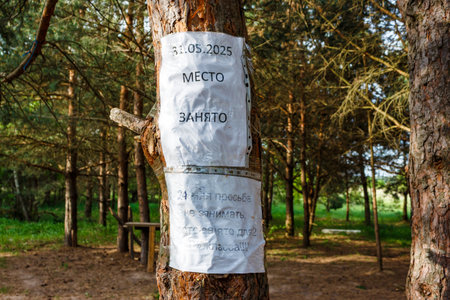 A sheet with a request not to occupy a place in the park in Russian: Russia - May 26, 2025