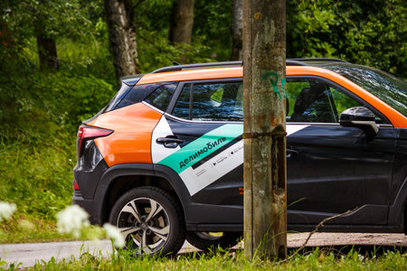 Delimobil rental car in the parking lot: Russia - July 2, 2025