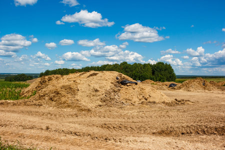 Heaps in the middle of an agricultural field