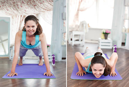 Pushups. yoga studio in the daytime. Young beautiful girl practicing fitness at home. yoga studio in the daytime. Purple yoga mat.の写真素材