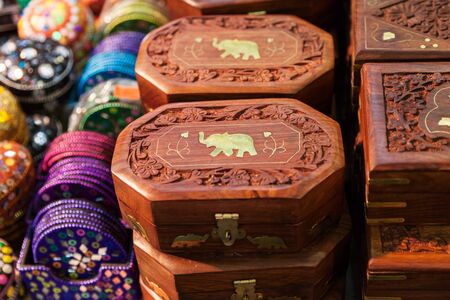 Traditional casket of rosewood inlaid with brass and carved in the Indian market. Casket with elephant is handmade in India.の写真素材